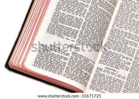 holy bible open to the book of  jonah, against a white background