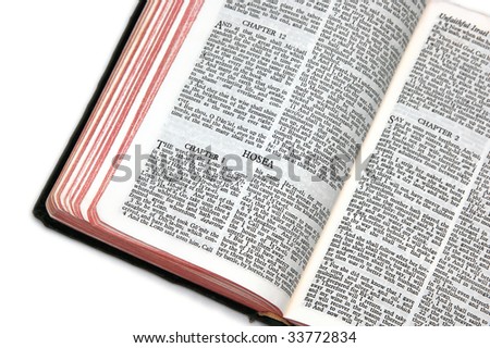 holy bible open to the book of  hosea, on white background