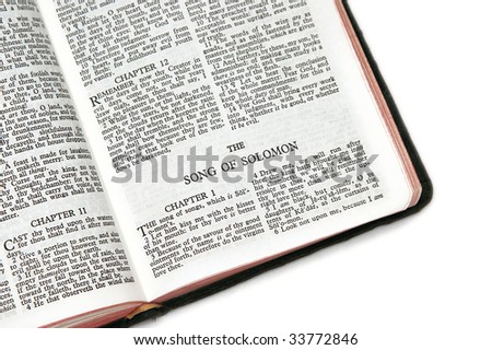 holy bible open to the song of solomon,on white background
