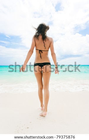 Beautiful Swimsuit on Beautiful Woman In Black Bikini On Tropical Beach Stock Photo 79375876