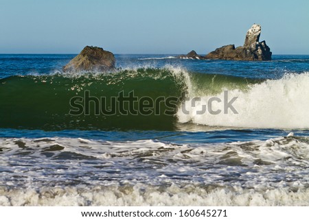 breaking green wave, Oregon coast