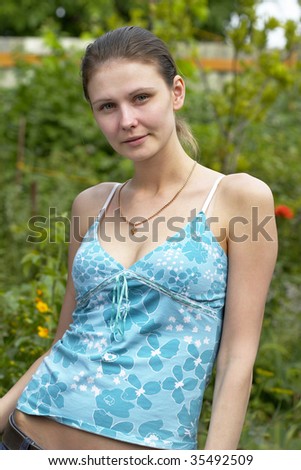 young woman in the garden makeup free