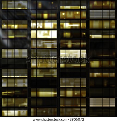 stock photo : Windows in a high rise tower block or skyscraper at night