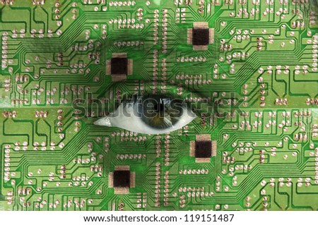 Technology concept - human face with open eye covered with electronic circuit texture