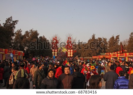 BEIJING - JANUARY 31: Crowds attending the Spring Festival Fair in January 2009 in the Ditan Park in Beijing, China. The fair was a major event to mark the celebrations for the New Year.01.31.2009, Beijing