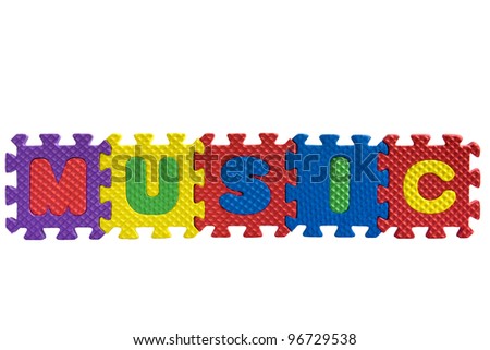 the word music written with alphabet puzzle letters the word music written with alphabet puzzle letters
