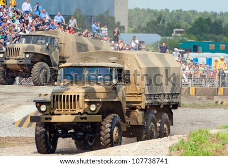 ZHUKOVSKY, RUSSIA - JULY 1: URAL-4320 family trucks run the obstacle course on the Forum ET-2012 on July 01, 2012 in Zhukovsky, Russia