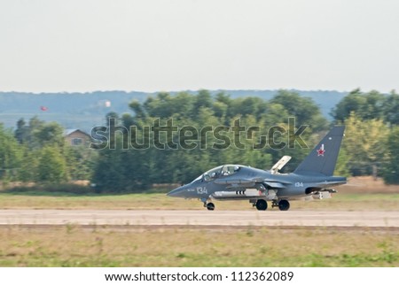 ZHUKOVSKY, RUSSIA - AUGUST 12: Yak-130 attack trainer runs after landing during the celebration of the centenary of Russian Air Force on August 12, 2012 in Zhukovsky, Russia