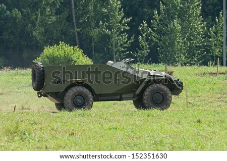 DUBOSEKOVO, RUSSIA - JULY 13: BTR-40 APC runs during Field of Battle military history festival on July 13, 2013 in Dubosekovo, Russia