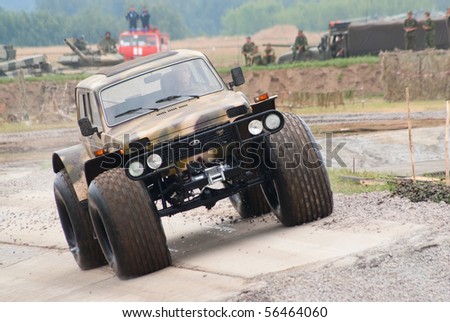 ZHUKOVSKY, RUSSIA - JULY 3: bigfoot modification of VAZ Niva car performs the trial ride on the Forum ET-2010 on July 03, 2010 in Zhukovsky, Russia