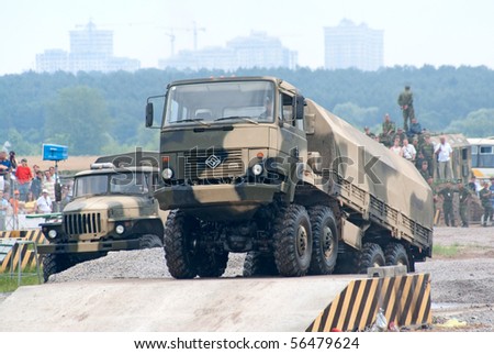 ZHUKOVSKY, RUSSIA - JULY 3: URAL military 8x8 truck climbs over an obstacle on the Forum ET-2010 on July 03, 2010 in Zhukovsky, Russia