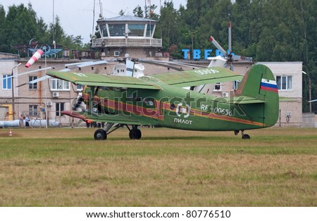 TVER, RUSSIA - JULY 09: Antonov An-2 multipurpose biplane taxis to the parking during the Tver Blue Skies aviation festival on July 09, 2011 in Tver, Russia