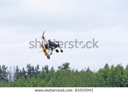 TVER, RUSSIA - JULY 09: An ultralight autogyro takes off during the Tver Blue Skies aviation festival on July 09, 2011 in Tver, Russia
