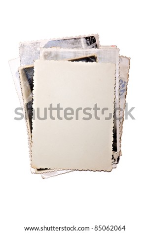 Bunch of old photos, back side on a top, isolated on white