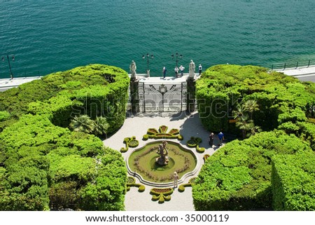 italian villa's garden by the lake