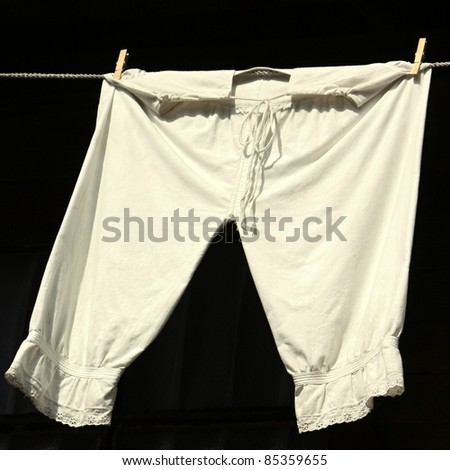 a pair of old white pants