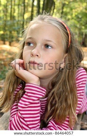 portrait of a beautiful pensive girl