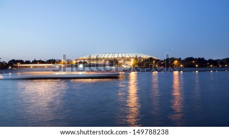 Embankment of the Moskva River and Luzhniki Stadium, night view, Moscow, Russia.