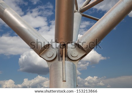 Metal column closeup on a background of sky