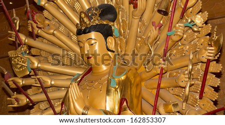 XIAN (SIAN, XI\'AN), CHINA OCTOBER 15: Golden statue of Buddha on October 15, 2013 in Xian, China. Buddhist Temple. Golden statue of Buddha-- southern Xian (Sian, Xi\'an), Shaanxi province, China.