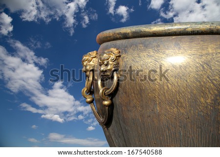 Large bronze bowl to extinguish fire with image Chinese dragon statue in the Forbidden City. Beijing, China