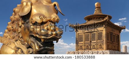 bronze Chinese dragon statue and bronze pagoda in the Forbidden City. Beijing, China