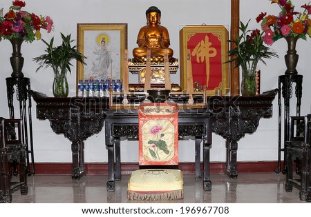 XIAN (SIAN, XI\'AN), CHINA OCTOBER 15, 2013: Buddhist Temple. Golden statue of Buddha-- southern Xian (Sian, Xi\'an), Shaanxi province, China