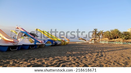 Paddle Boat on the beach. Costa del Sol (Coast of the Sun), Malaga in Andalusia, Spain