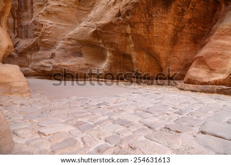The 1.2km long path (As-Siq)  to the city of Petra, Jordan-- it is a symbol of Jordan, as well as Jordan\'s most-visited tourist attraction. Petra has been a UNESCO World Heritage Site since 1985