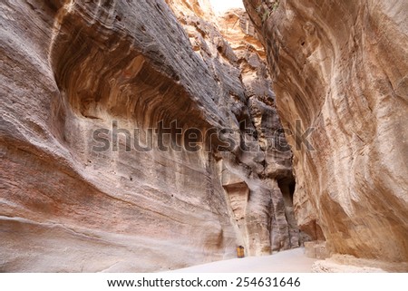 The 1.2km long path (As-Siq)  to the city of Petra, Jordan-- it is a symbol of Jordan, as well as Jordan\'s most-visited tourist attraction. Petra has been a UNESCO World Heritage Site since 1985