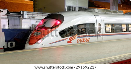 MOSCOW, RUSSIA - JUNE, 05 2015: Aeroexpress Train Sapsan at the Leningrad station (night). Moscow, Russia -high-speed train acquired OAO \