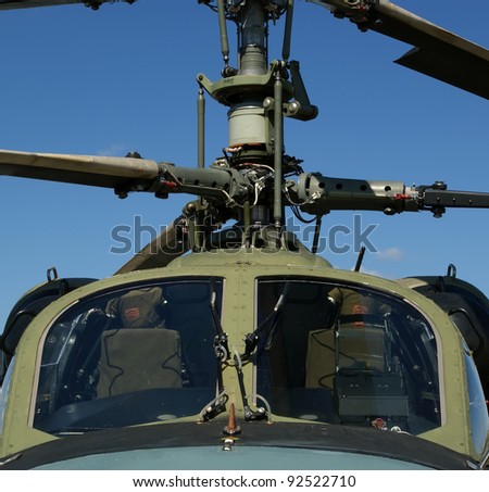 Details of the rotor and part of the body of modern military helicopters closeup
