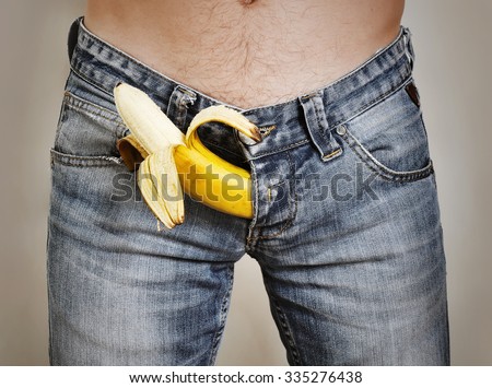 Banana sticking out of men\'s jeans
