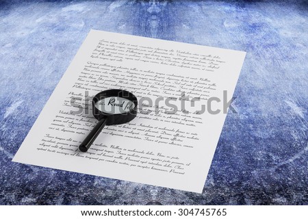 Magnifying glass enlarging the word Read on a page with printed text laying on a textured surface