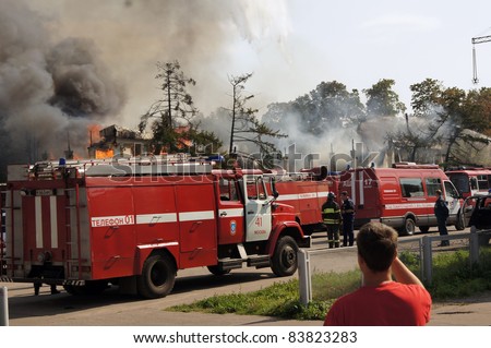 MOSCOW - AUGUST 30:  Firemen extinguish a fire in pavilion \