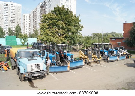 MOSCOW - AUGUST 30: Rank of tractors and minibulldozers on \