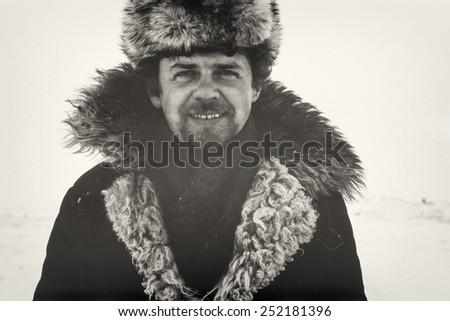 Outdoor vintage portrait of soviet gold-prospector taken in tundra on Chukchi Peninsula in 1979