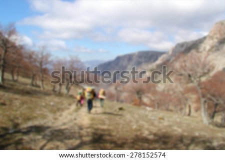Blurry background - spring mountain landscape with hiking track