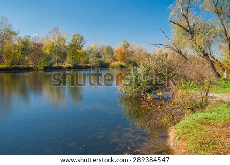 Small Ukrainian river Oril (left inflow of biggest river Dnepr) at fall season