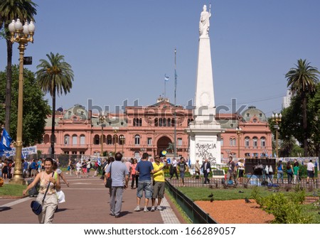 Buenos Aires, Argentina - December 13, 2012: Protesters and tourists in the Plaza de Mayo, the heart of Argentina\'s political life. In Buenos Aires, on December 13, 2012.