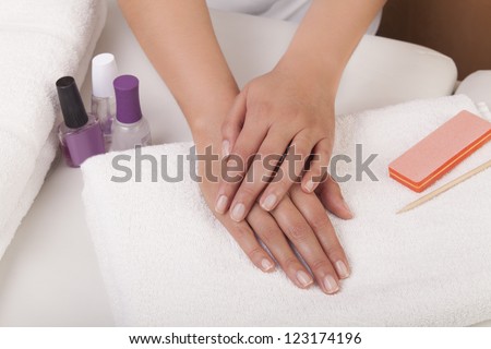 Beauty treatment photo of nice manicured woman hands