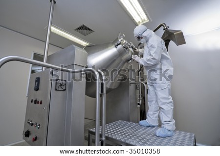 Specialized workers at pharmaceutical manufacturing facility