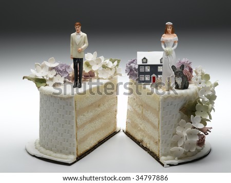  and groom figurines standing on two separated slices of wedding cake