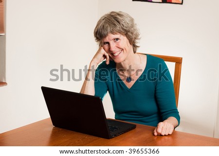 Portrait of a smiling computer user