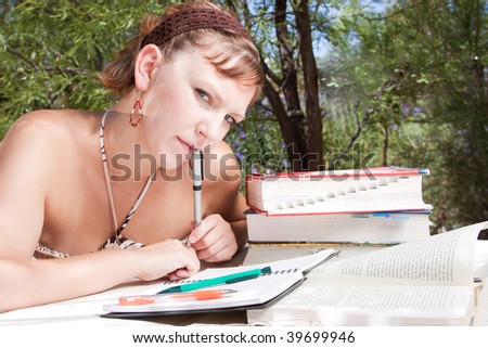Young student studying outside