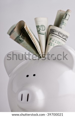 Fully stuffed piggy bank, lots of savings