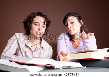 Two confused students work on a problem