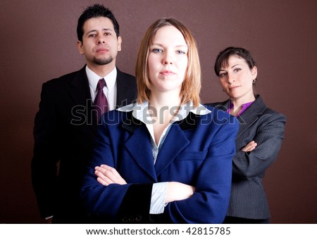 This woman exudes power, flanked by her staff