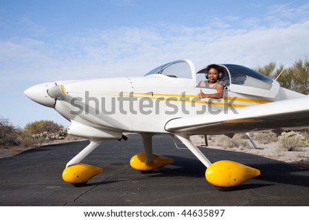 Pilot and plane on the runway