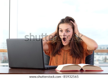 Student tears her hair out, stressed computer user